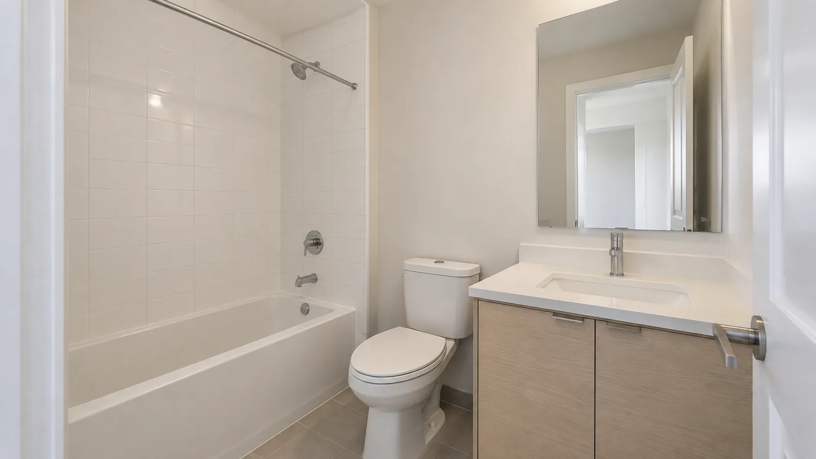 Bathroom with a vanity cabinet and white trim